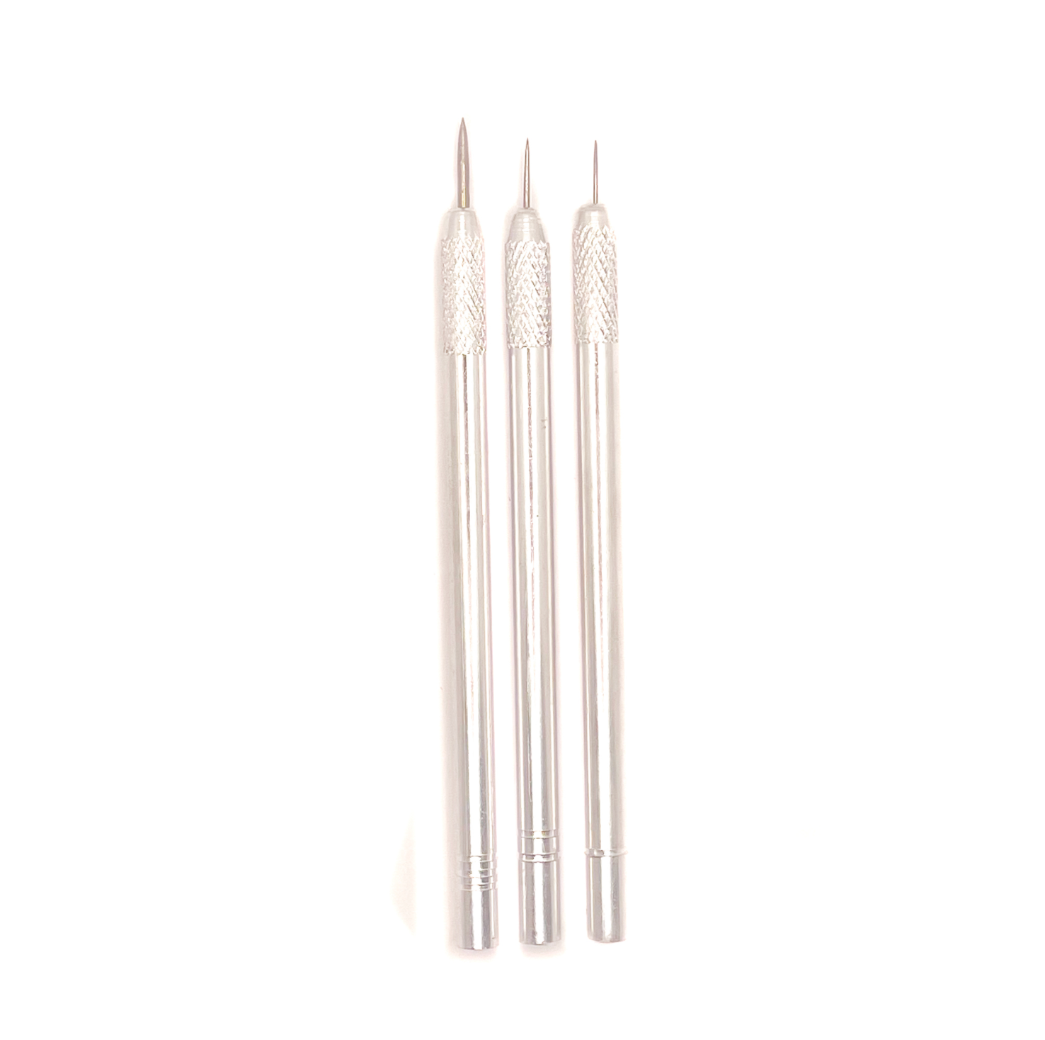 Set of three metal pin tools for ceramics, ideal for etching, scoring, and fine detailing in pottery and clay sculpting.